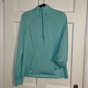 Zella Aqua 1/2 zip running jacket. Beautiful color, pocket across front. EUC
